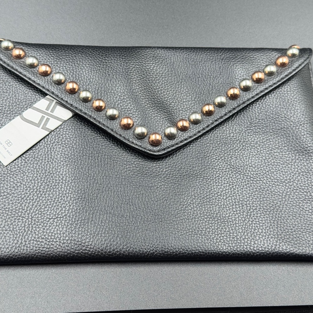 NWT. VEGAN  below the belt clutch